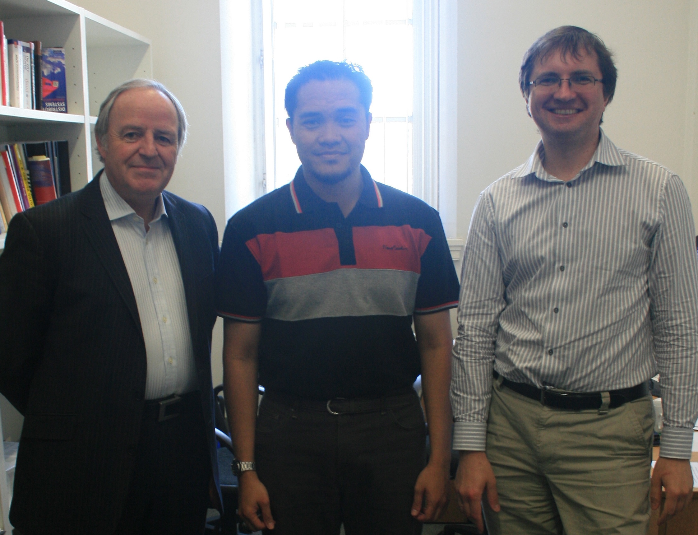 Hanfi Hijazi, external examiner Prof. Tim Ritchings (left)
	and internal examiner Boris Konev (right)